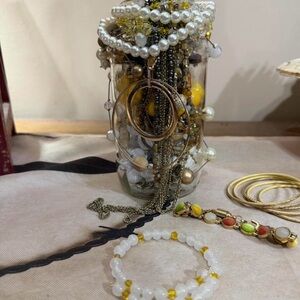 Yellow tone mystery jewelry jar